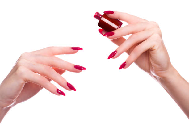 istock Bright festive red manicure on female hands. Nails design 1159030230