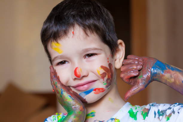 istock Face, painted, hands, white t-shirt 1159030946