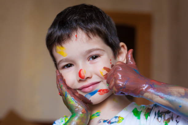 istock Face, painted, hands, white t-shirt 1159030952