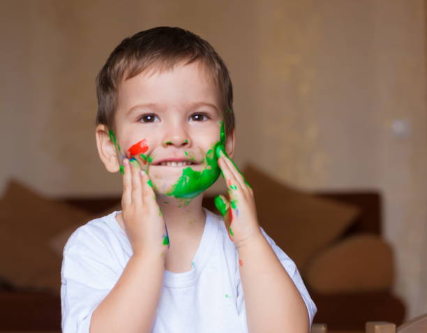 istock Face, painted, hands, white t-shirt 1159031554