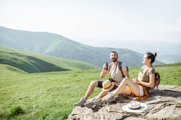 istock Couple traveling in the mountains 1159032403