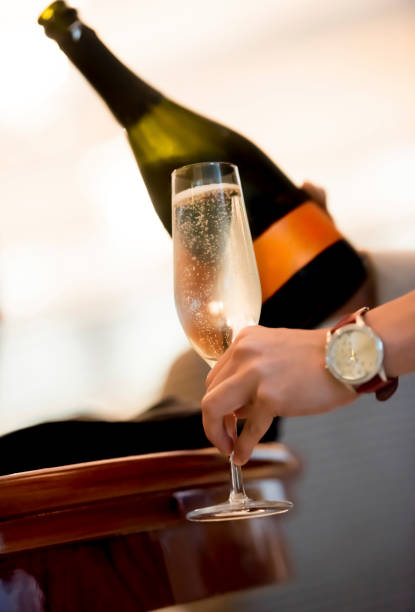 istock Pouring champagne in the glass 1159035353