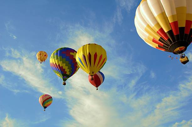 colorido vuelo de 6 - balloon blowing inflating child fotografías e imágenes de stock