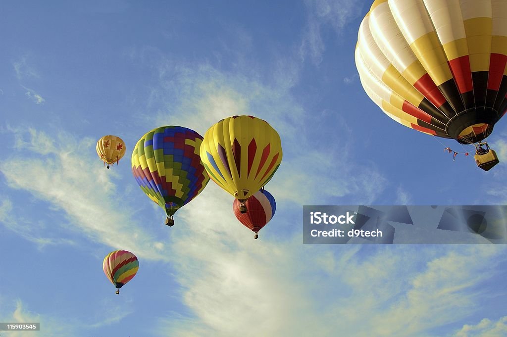 Colorful Flight of 6 A group of 6 bright colorful balloons soar in the air. Hot Air Balloon Stock Photo