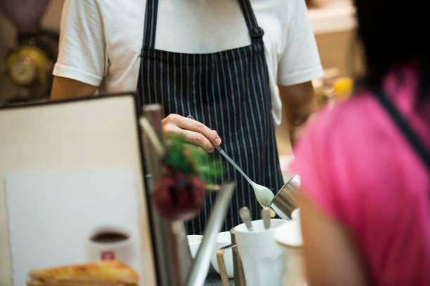 istock Chef cooking food in front of customers 1159035493
