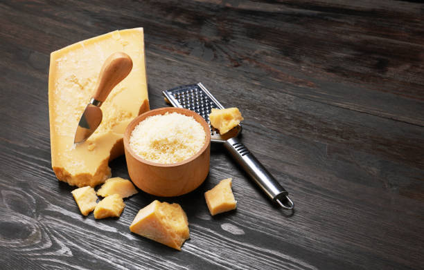 istock Parmesan cheese on wooden board 1159036578