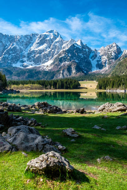 istock Spring morning at the alpine lake 1159037789