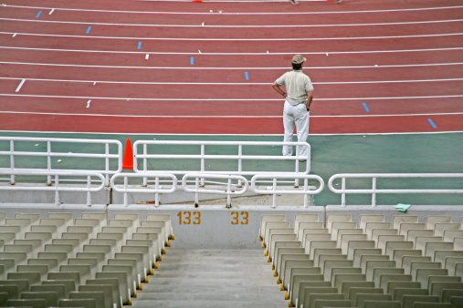 The trainer of an athletics team following the race.