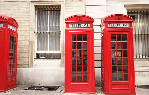 three london red telephone boxes