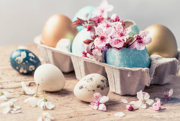 istock Easter holiday colored eggs and flowers. 1159045481