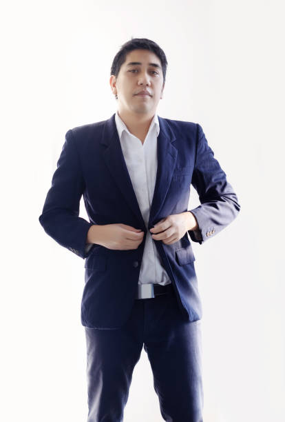 istock smart asian businessman in blue tone business uniform 1159046320
