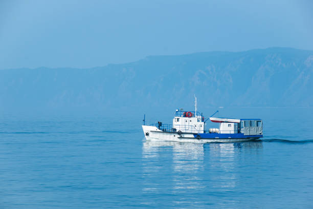 istock The white ship sails on lake Baikal on a Sunny day. 1159046367
