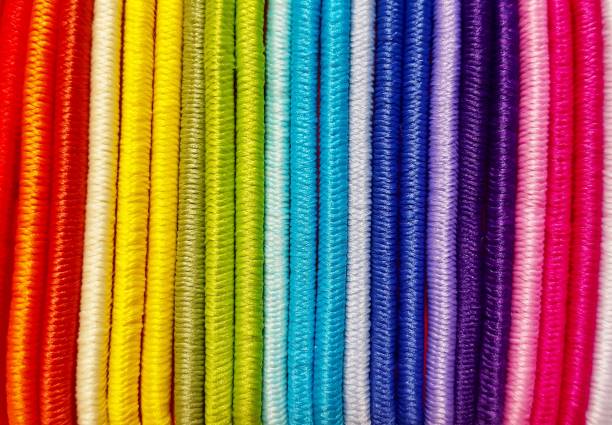 istock Different colored hair ties all in a row. 1159046639