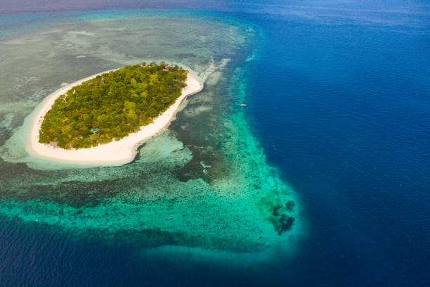 istock Mantigue Island, Philippines.Small round island with a white sandy beach 1159047509