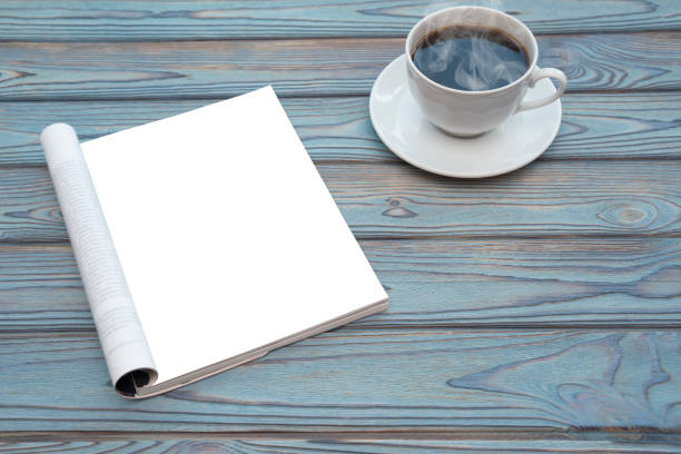 istock Open Blank catalog, magazines, book mock up on wood table with coffee 1159049934