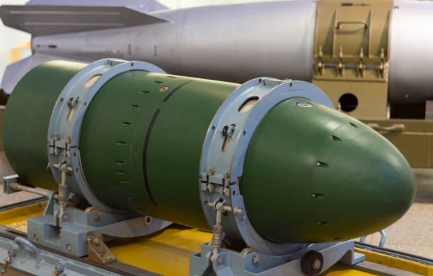 istock warhead on transport stand, against a rocket. 1159053782