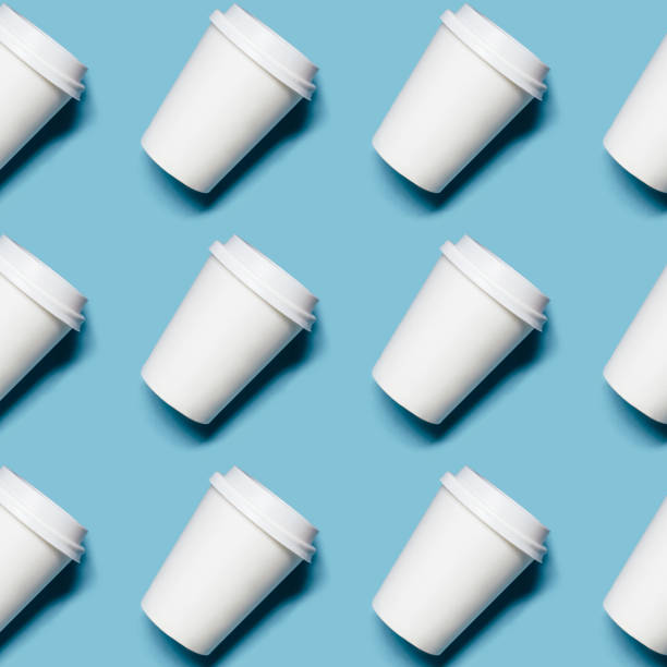 istock Lot of paper cups on blue background 1159056273