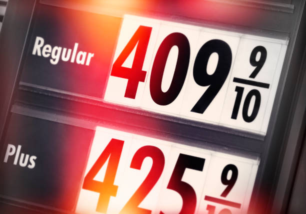 Gas Price Sign A gas price sign at a gas station. fuel prices photos stock pictures, royalty-free photos & images