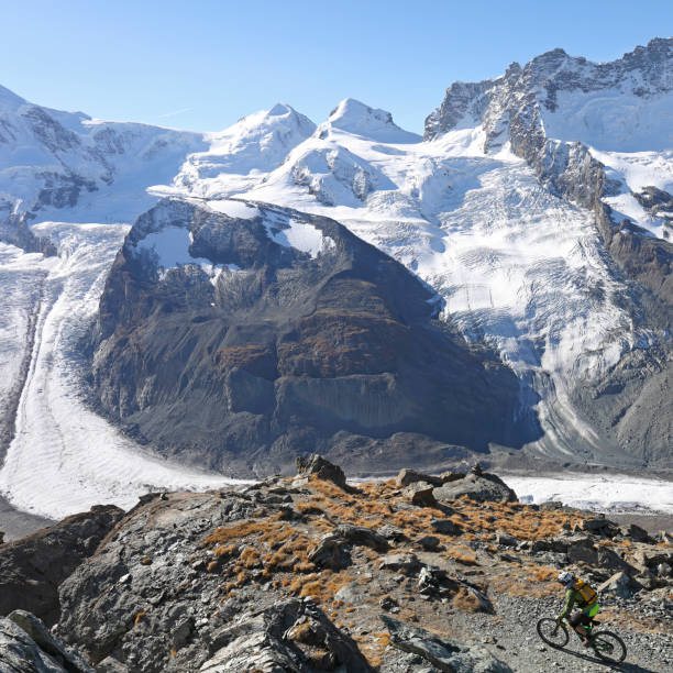 istock Mountain biker rides to glacier overlook on the Gornergrat 1159057678