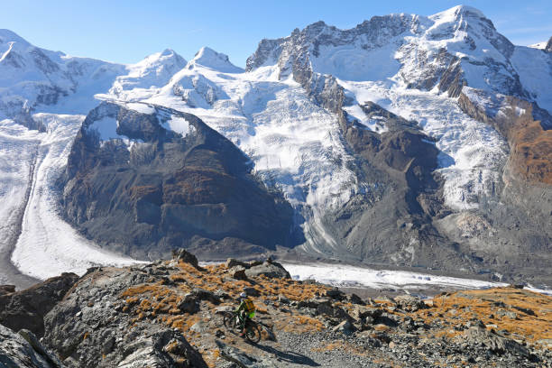 istock Mountain biker rides to glacier overlook on the Gornergrat 1159057748