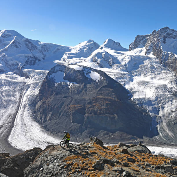 istock Mountain biker rides to glacier overlook on the Gornergrat 1159057751