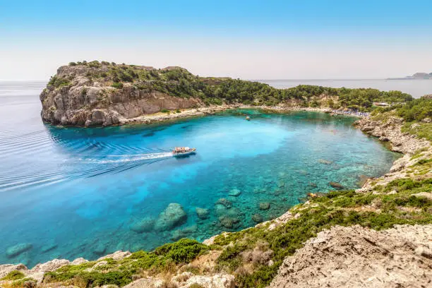Popular tourist attraction on Rhodes island - azure lagoon known as Anthony Quinn Bay. Sea travel and summer paradise concept