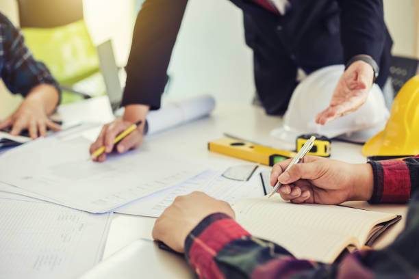 istock Architect people design planning and presenting the project at the meeting 1159058772