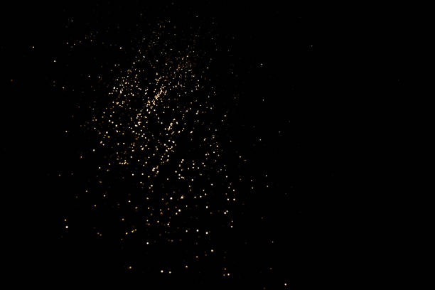 istock Golden abstract bokeh on black background. 1159059888
