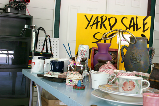 Table of yard sale items.