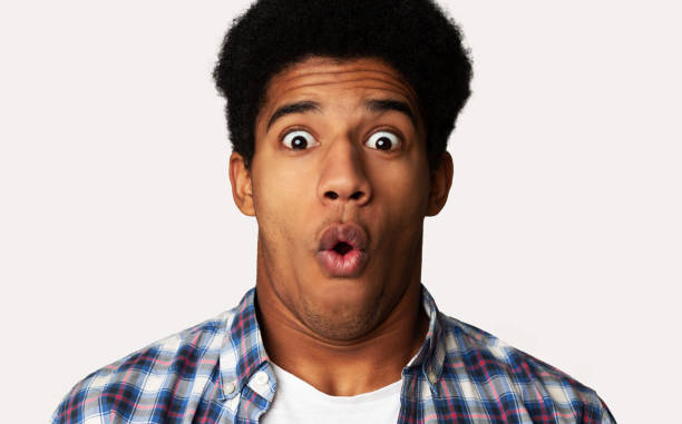 istock Horrified Guy Looking in Terror at Camera, Shocked Emotion 1159063447