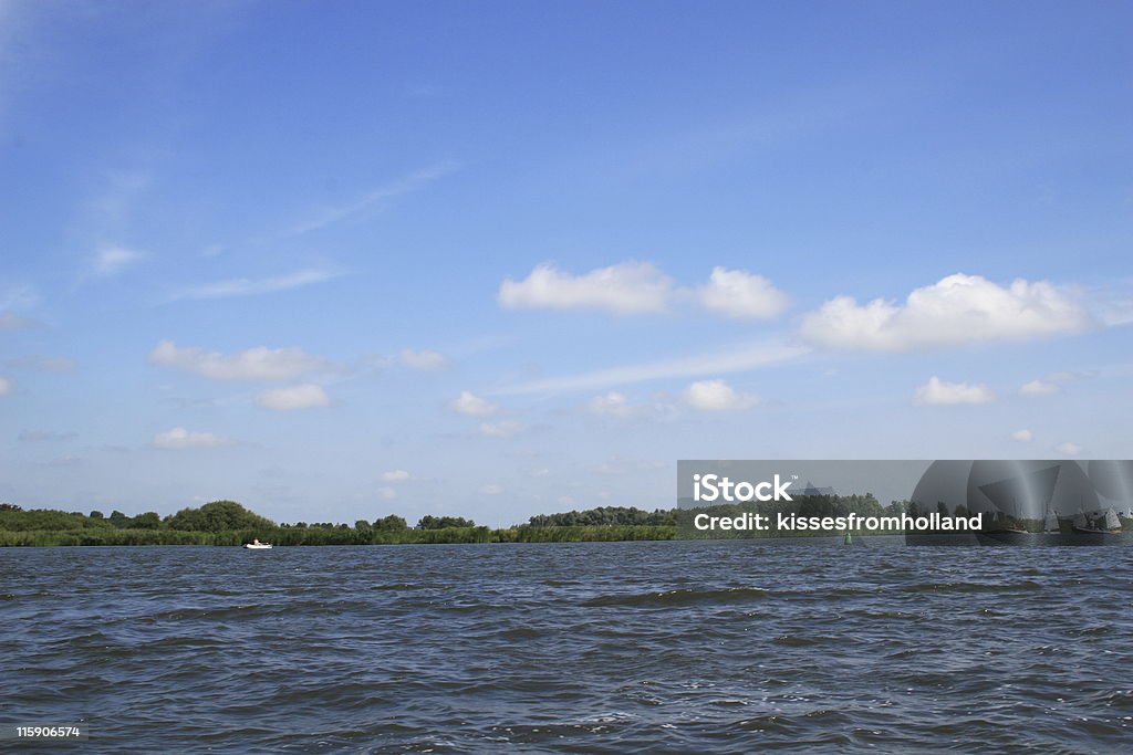 네덜란드 클라우드를 통해 호수 - 로열티 프리 곡선 스톡 사진
