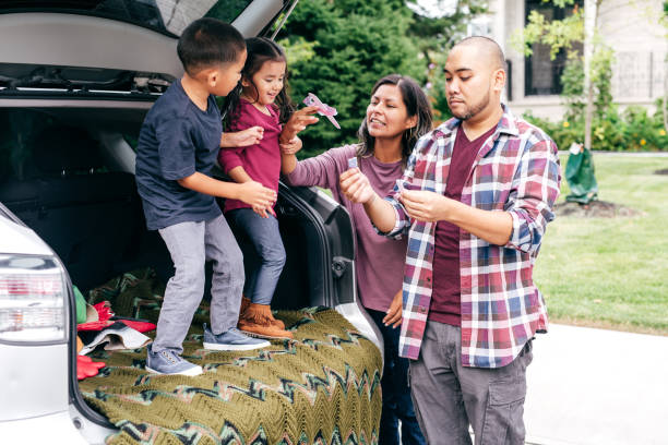 istock Little kids with parents . 1159072088