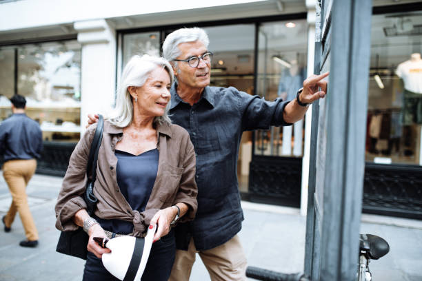 istock Senior couple walking in Paris 1159072092
