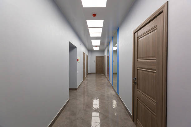istock Interior of typical office - empty corridor - without furniture after construction,overhaul, remodeling, rebuilding, home improvements and renovation. 1159075452