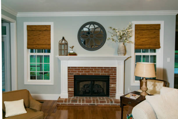istock Empty traditional living room den with a fireplace 1159076457