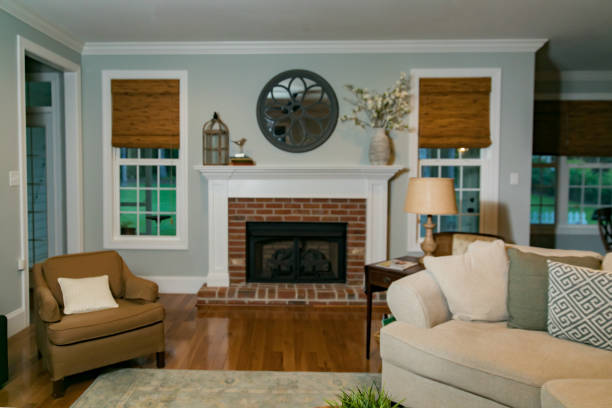 istock Empty traditional living room den with a fireplace 1159076505