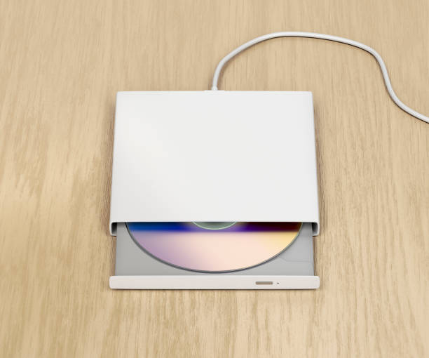 Portable optical disc drive External optical disc drive on wood background open cd player stock pictures, royalty-free photos & images