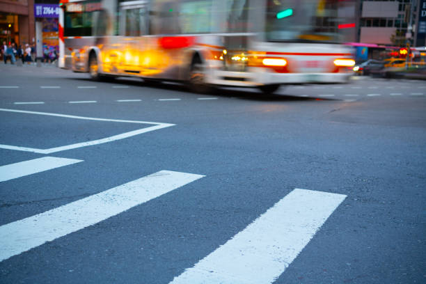 istock Motion blurred bus, Traffic in Taipei, just after sunset 1159079963