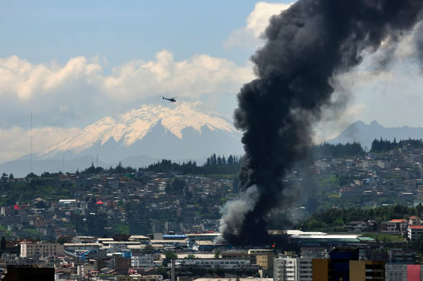 Aerial firefighting with helicopter on a big fire.