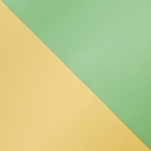 istock Top view of double color paper background 1159085236