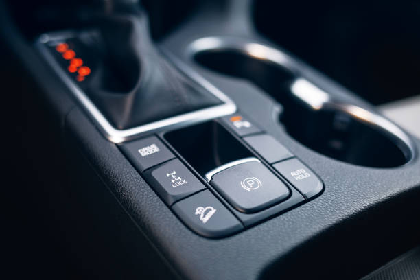 istock Electric handbrake button of modern car 1159087224