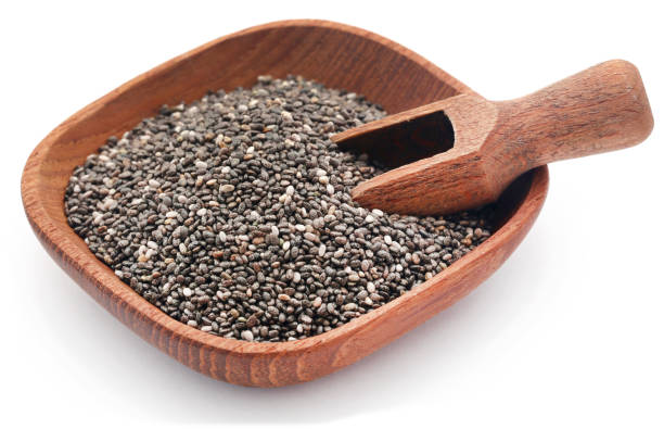 Organic Chia Seed Organic Chia Seed a super food with wooden scoop salvia hispanica plant stock pictures, royalty-free photos & images