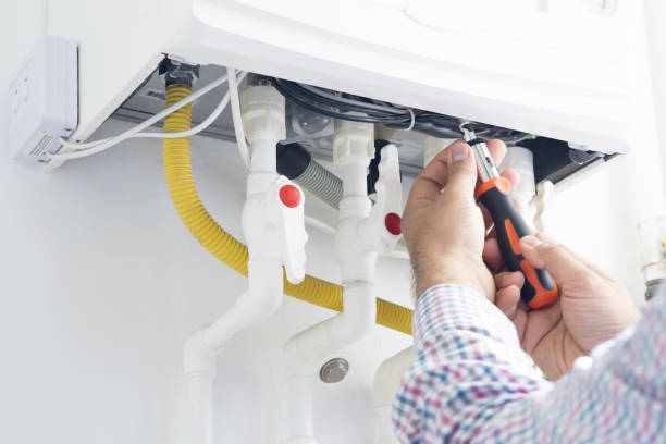 istock Technician repairing gas heater at home 1159090901