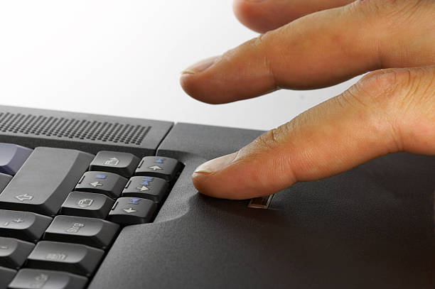 Cтоковое фото Ноутбук с палец принтом безопасности