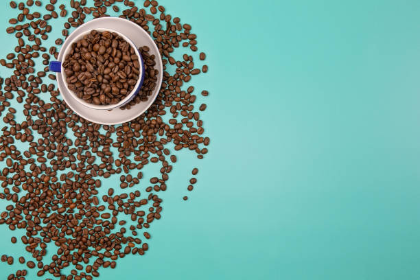 istock Roasted Coffee Beans Sprinkled And In A Cup 1159092905