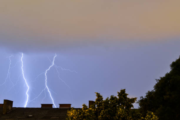 istock Lightning strikes behind building during storm in Croatia 1159097539