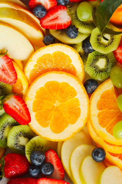 istock Fresh fruits and berries close up, top view 1159097559