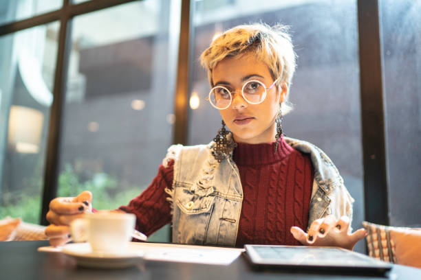 istock Latin woman checking some graphics from digital investment 1159100498