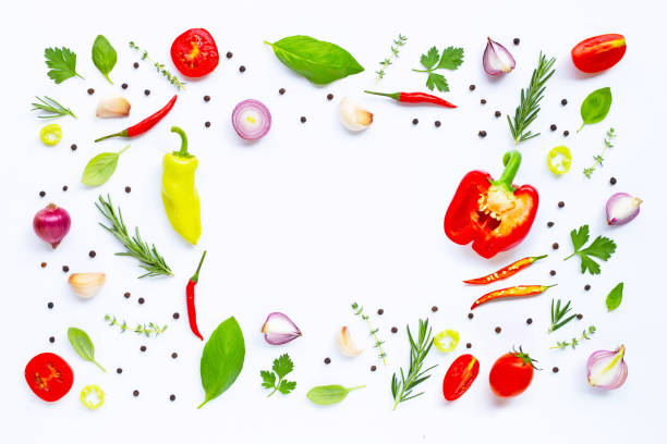 istock Various fresh vegetables and herbs on white background. Healthy eating concept 1159102798
