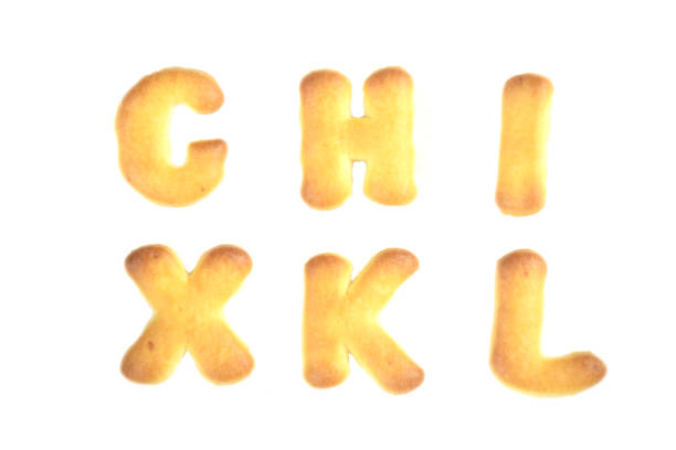 istock cookies alphabet isolated on white background 1159102830